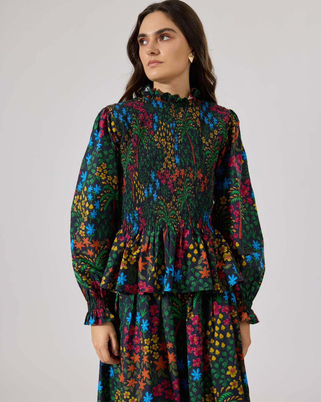 FLEUR SMOCKED PEPLUM TOP FLORIDO BLACK