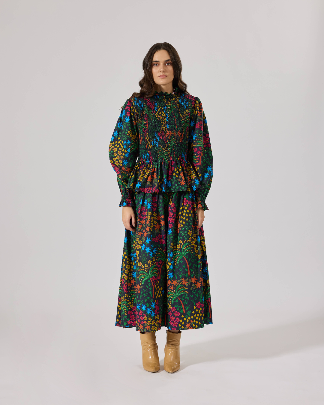 FLEUR SMOCKED PEPLUM TOP FLORIDO BLACK