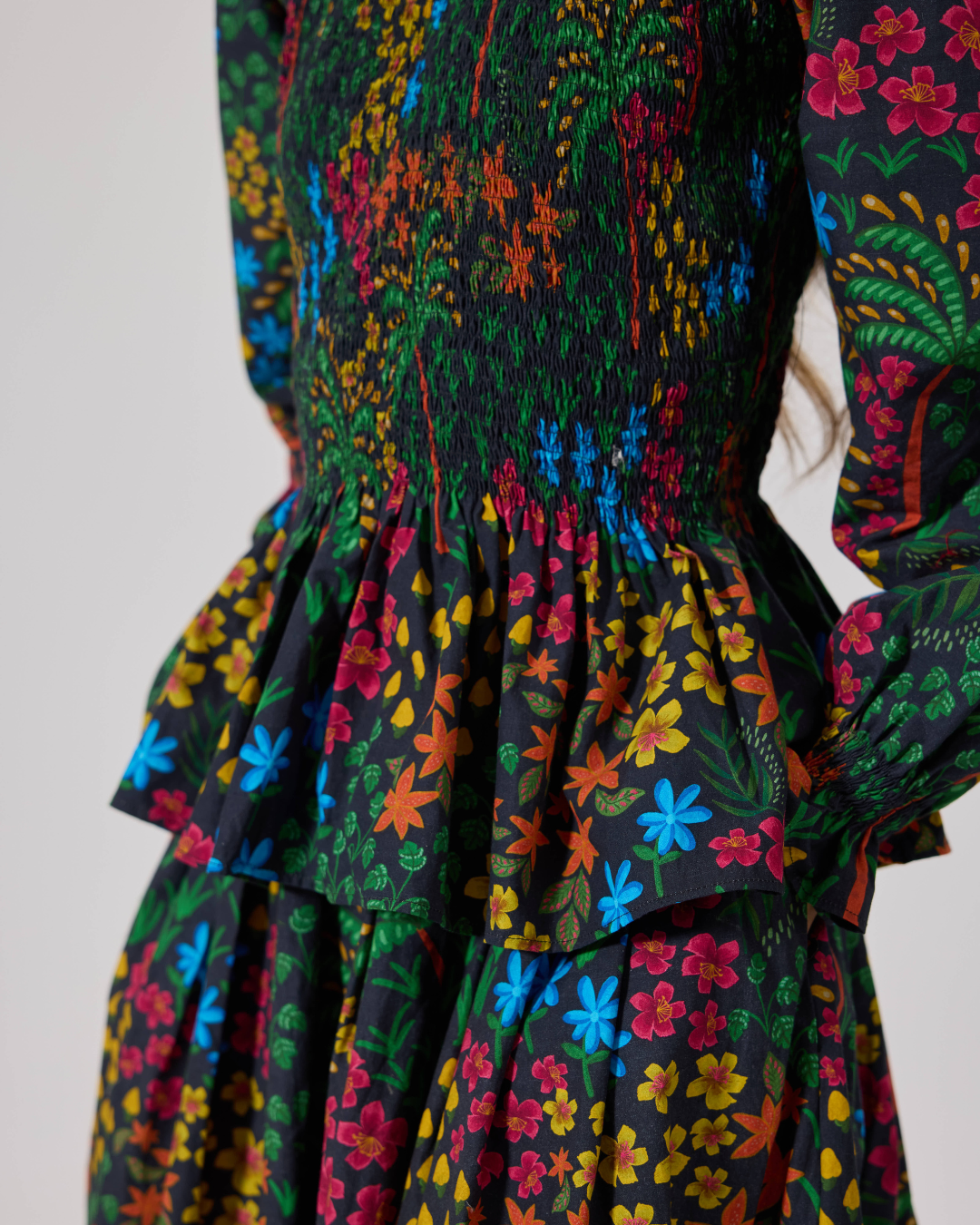 FLEUR SMOCKED PEPLUM TOP FLORIDO BLACK